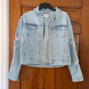 Ripped denim jean jacket light wash